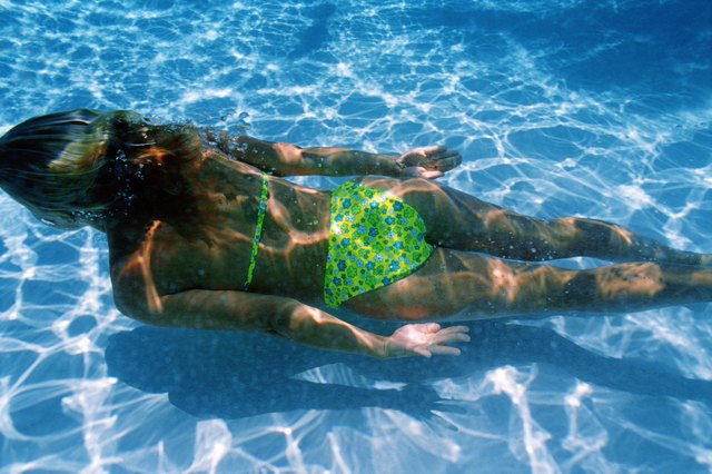 Woman swimming underwater
