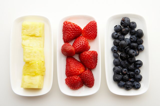 Variety of fresh fruit on plates