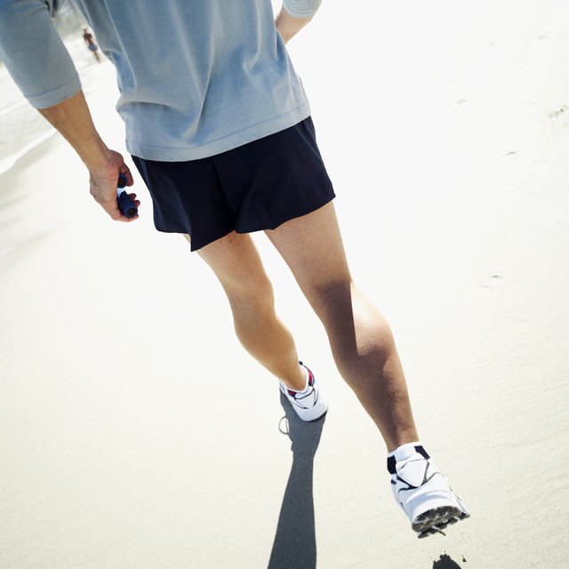 man jogging at sea shore