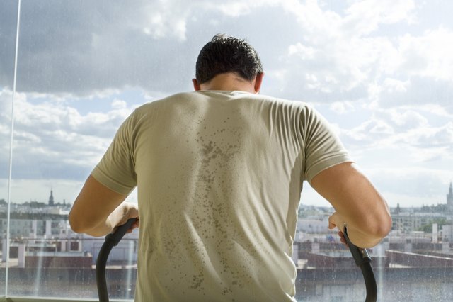 Man using exercise equipment