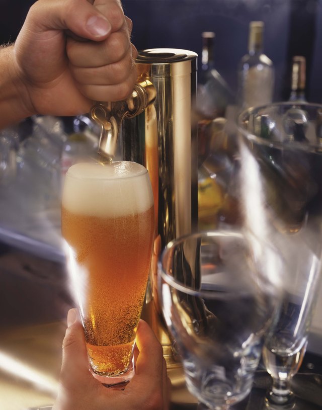 Person pouring beer