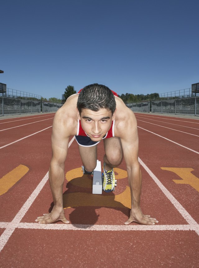 Male track athlete at the starting line