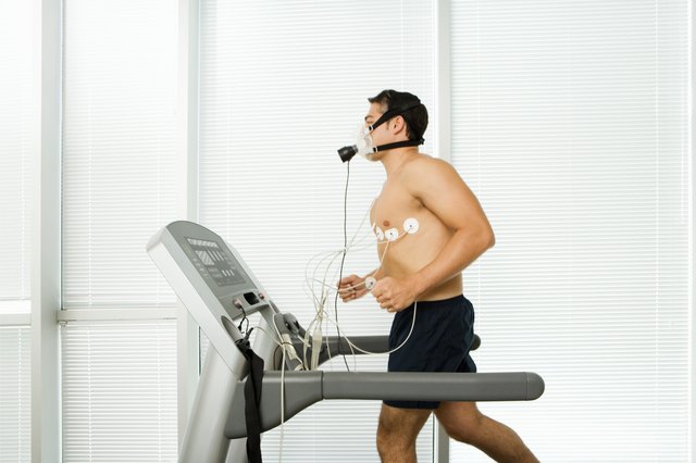 Man wearing medical testing equipment on a treadmill
