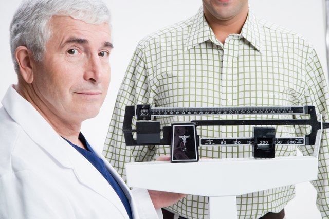 Docotr and patient with scale