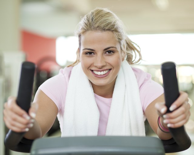 Happy woman cycling