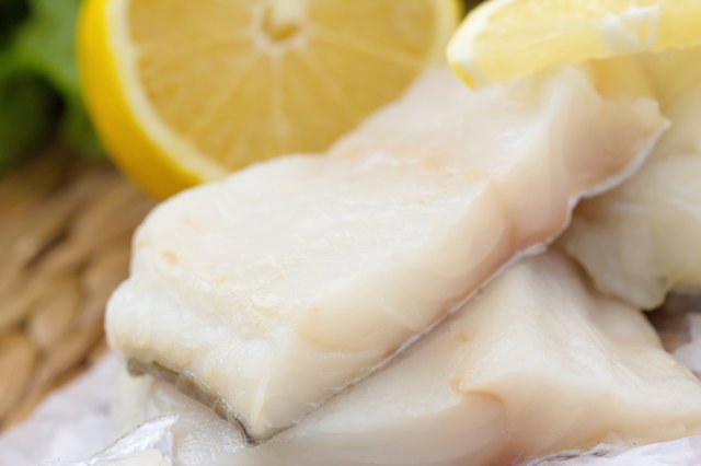 Raw fish with vegetables, lemon and seasonings