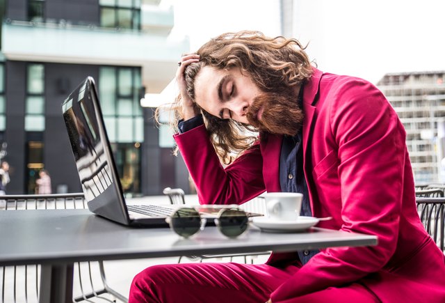 Hipster man working at computer