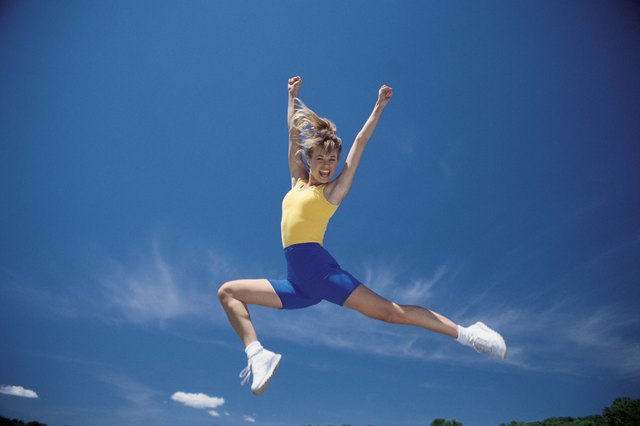 Cheerleader leaping in air