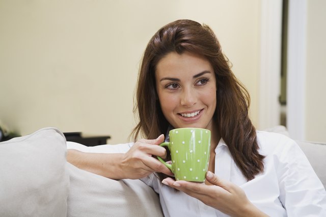 Woman holding coffee mug
