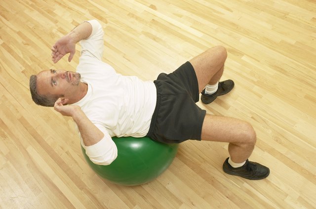Man on fitness ball