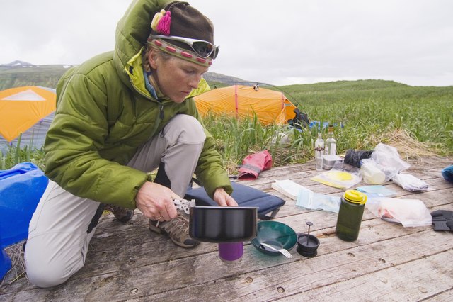 Man cooking at campsite