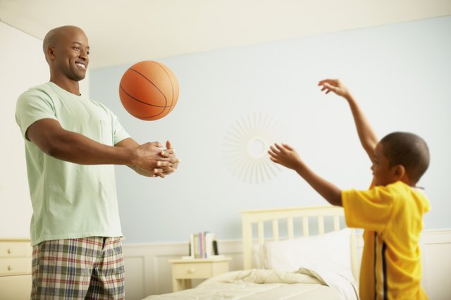 Father and Son Practicing Basketball