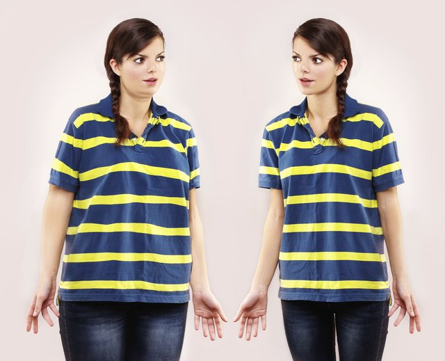 Fat girl standing in front of thin one