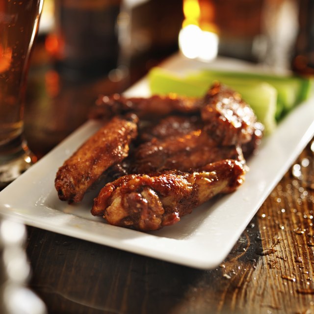 barbecue chicken wings with beer and celery