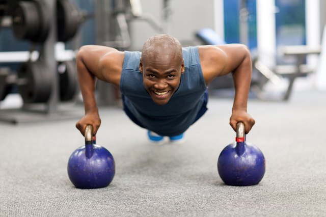 young african man doing push-ups exercise