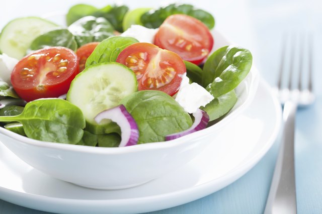 salad with tomatoes cucumber and goat cheese
