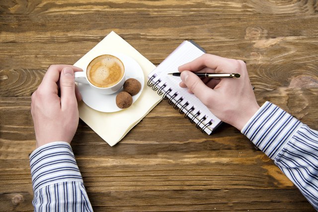 man drinking coffee with chocolates