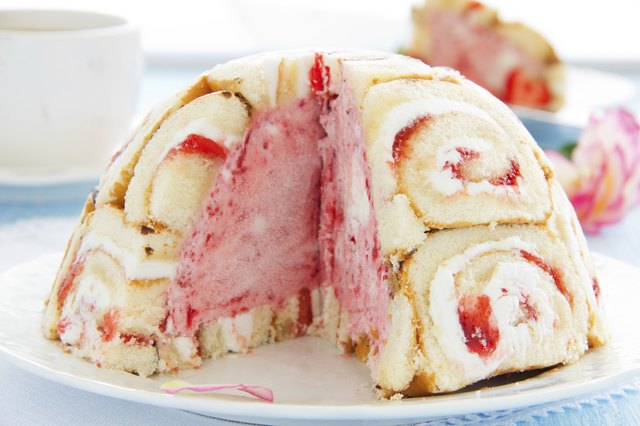 Cake "Charlotte royale" with ice cream and Swiss rolls.