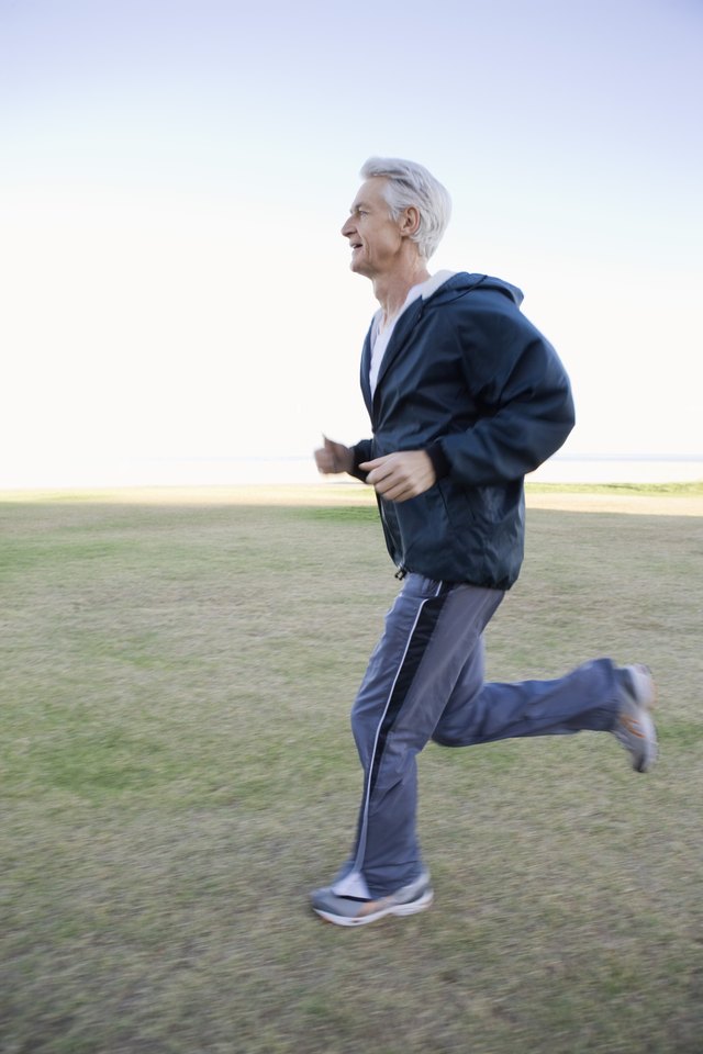 Man jogging in field