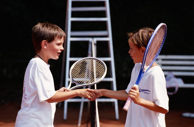 Two boy shaking hand