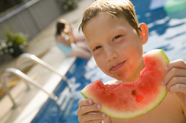 Boy eating watermelon