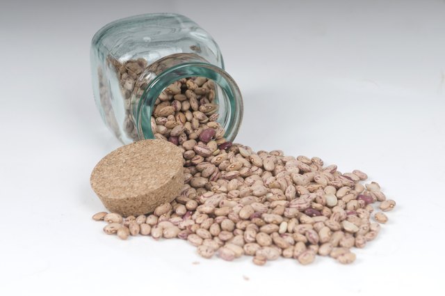 Half filled transparent Jar of red haricot