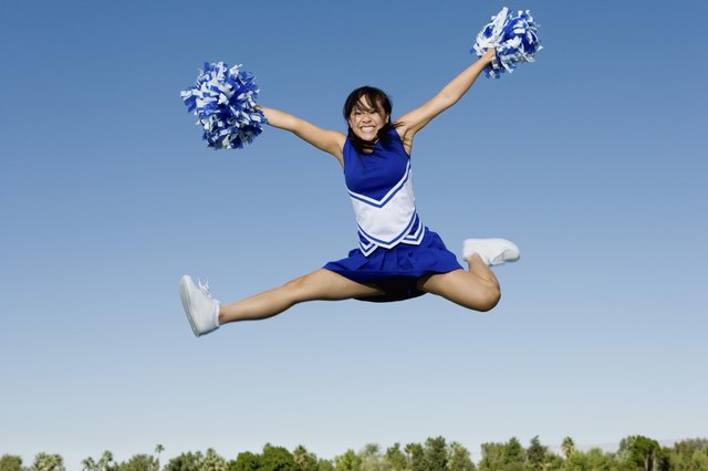 Jumping Cheerleader Performing Cheer in Mid-Air