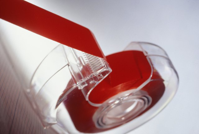 Reel of red tape, (Close-up)