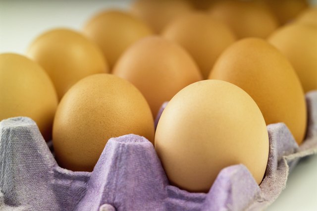 Brown eggs in a row, close-up, part of