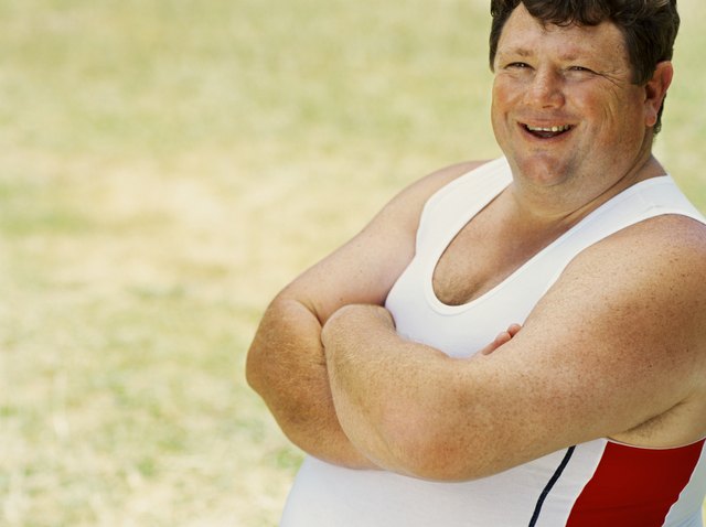 portrait of a mid adult man with his arms crossed