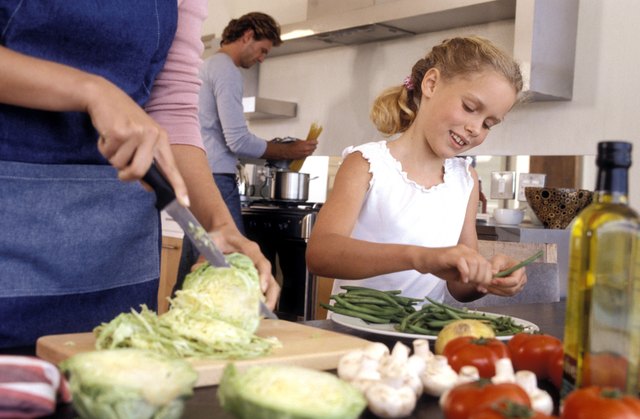 Girl preparing vegetables