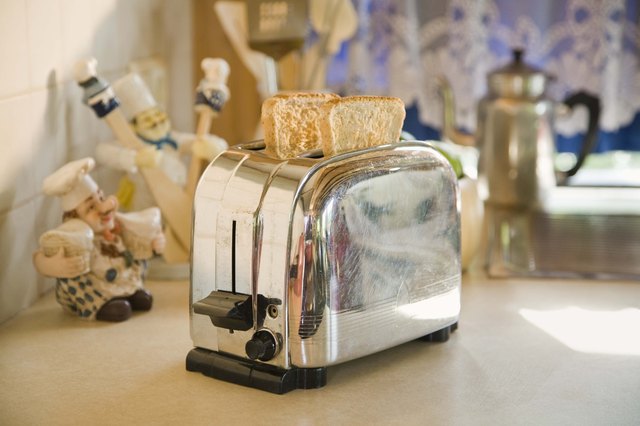 Toast in toaster on table