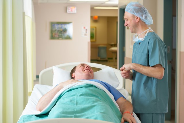 Surgeon talking to patient