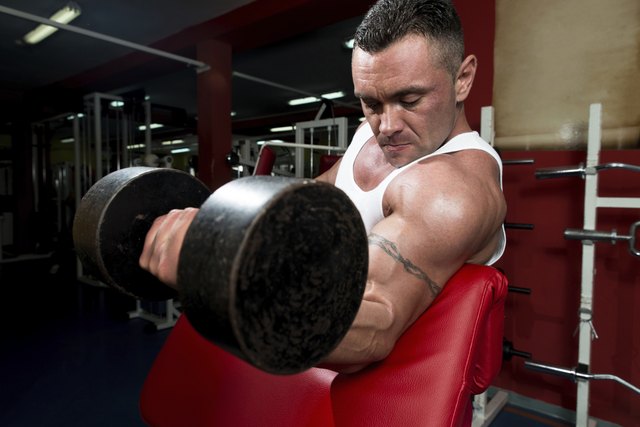 Powerful Muscular Man Lifting Weights