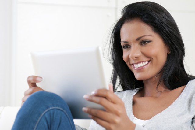 Girl enjoy modern tablet