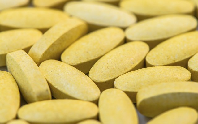 Vitamin C tablets macro closeup