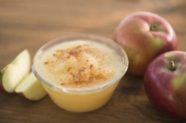 Studio Shot of apple sauce and apples