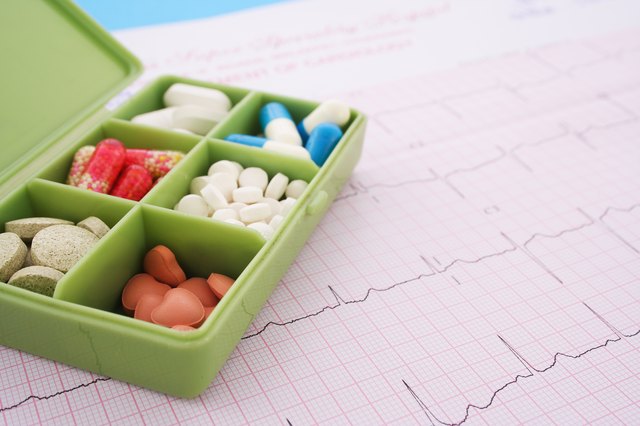 A box of medicine on a pulse trace sheet