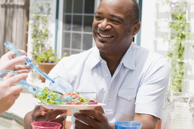 Smiling man with healthy salad
