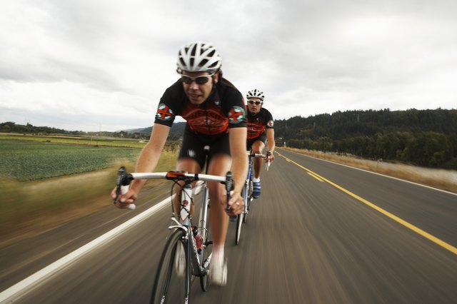 Road cyclists in action on country road