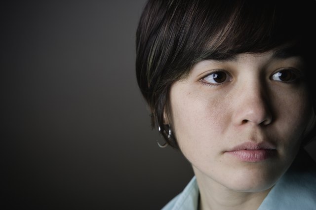 Close up of young woman looking to the side