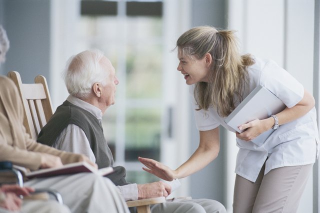 Nurse with man on porch