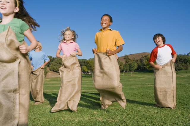 Children potato sack racing