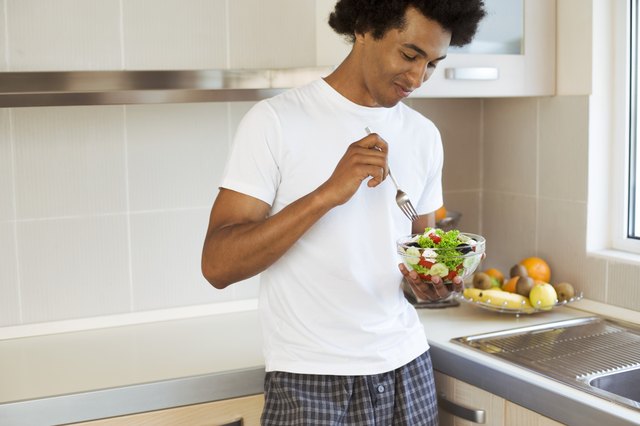 Man eating salad