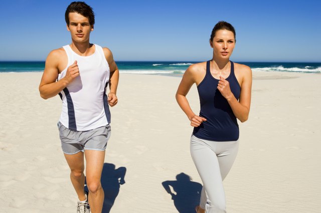 Couple running on beach