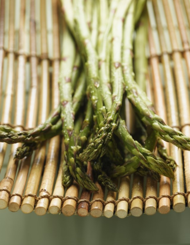 Close up of asparagus on bamboo