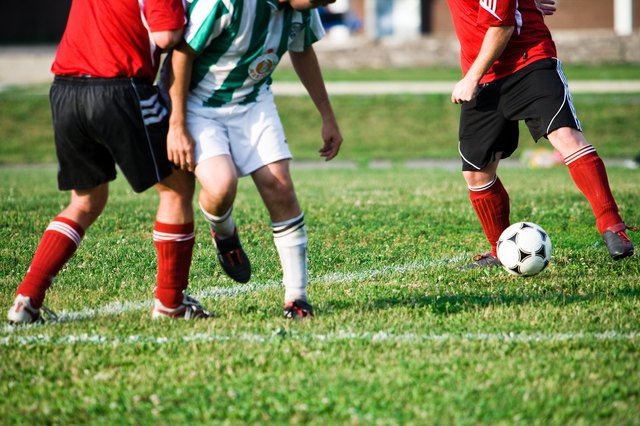 Players competing in soccer match