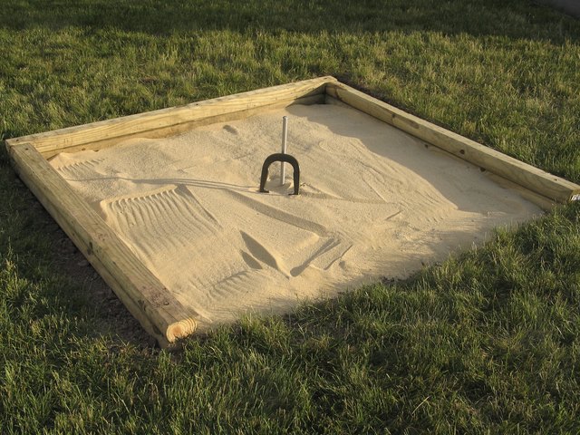 How to Build a Regulation Horseshoe Pit | Livestrong.com