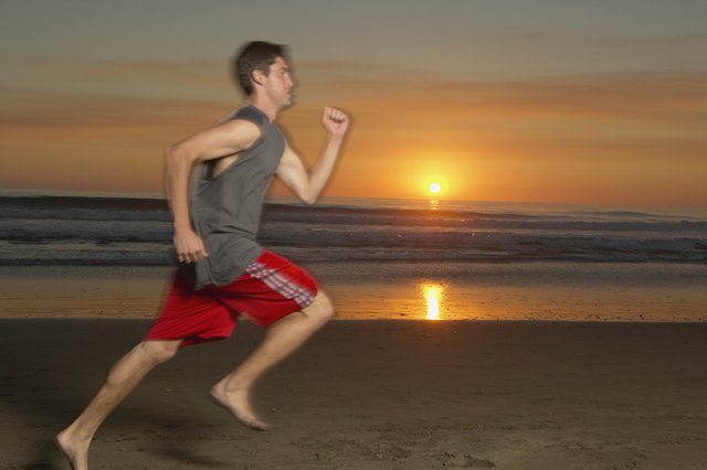 Man jogging on beach