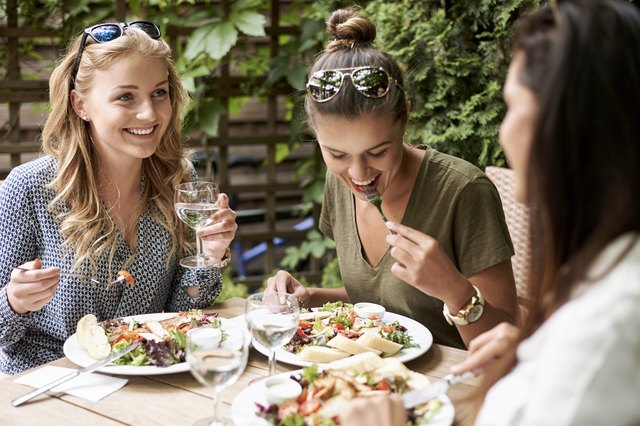 Girls eating together at a restaurant
